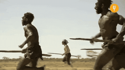 Men Running In Field With Yellow Y GIF