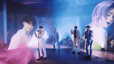 Men Singing Into Microphones GIF