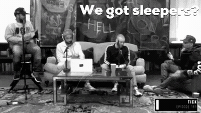 Men Sitting Around Microphone GIF