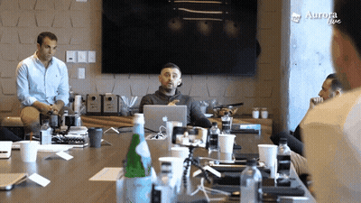 Men Sitting Around Table Aurora Live GIF