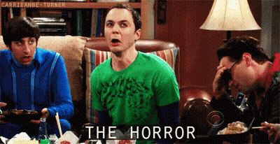 Men Sitting Around Table Saying The Horror GIF
