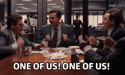 Men Sitting Around Table GIF