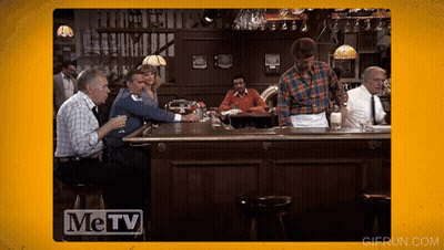 Men Sitting At Bar With Metv Logo GIF