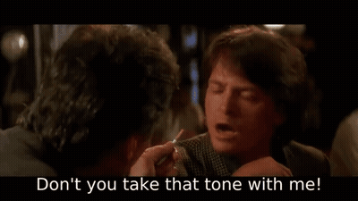 Men Sitting At Table Smoking GIF
