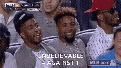 Men Sitting In Baseball Stands GIF
