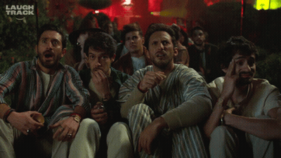 Men Sitting In Front Of Laugh Track GIF
