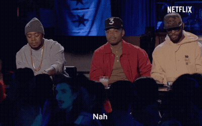 Men Sitting In Front Of Netflix Sign GIF