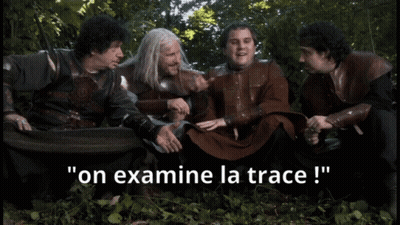 Men Sitting In Woods Say On Examine La Trace GIF