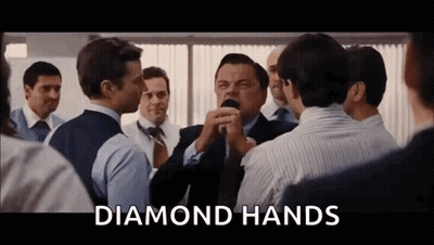 Men Standing Around Man With Diamond Hands Sign GIF