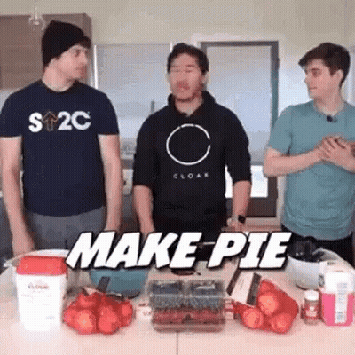 Men Standing Around Table With Fruits And Vegetables Saying Make Pie GIF
