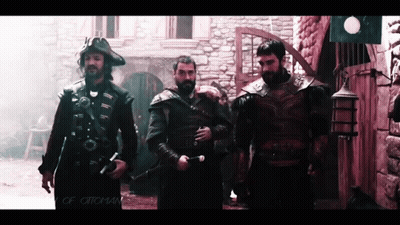 Men Standing Before Stone Building Saying Ottomans GIF
