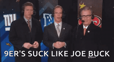 Men Standing In Front Of 9Ers Suck Like Joebuck Sign GIF