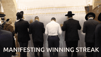 Men Standing In Front Of Wall Manifesting Winning Streak GIF