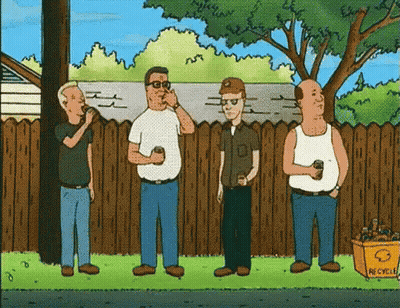 Men Standing In Front Of Wooden Fence With Recycling Bin GIF