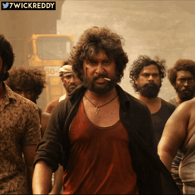 Men Standing In Front Of Yellow Truck Saying 60 GIF