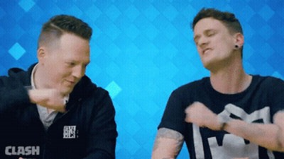 Men Standing Next To Each Other GIF