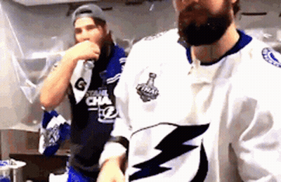 Men Standing Next To Each Other GIF