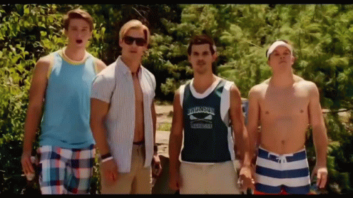 Men Standing Next To Each Other GIF