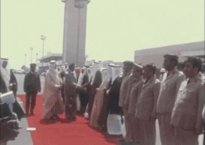 Men Standing On Red Carpet GIF