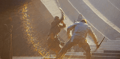 Men Standing On Stairs Holding Swords GIF