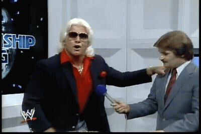 Men Talking In Front Of Worship Sign GIF