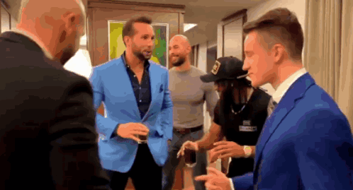 Men Talking In Room GIF