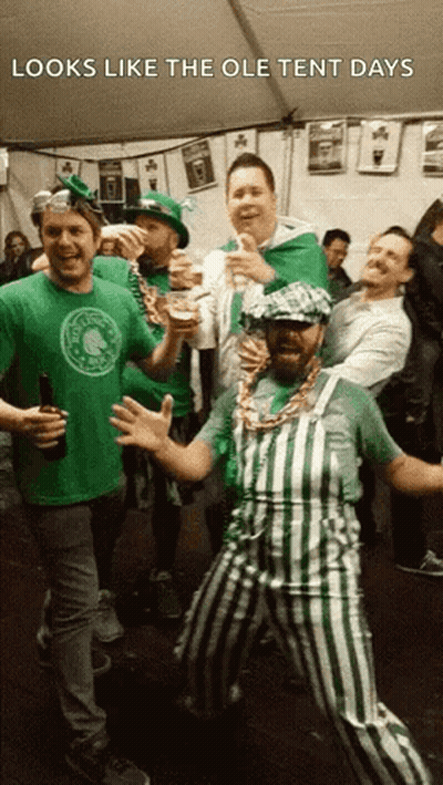 Men Under Tent In Green Celtics Shirt GIF