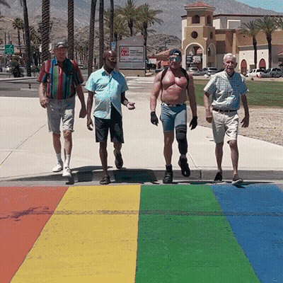 Men Walking Across Rainbow Crosswalk GIF
