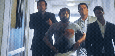 Men Walking Down Hallway GIF