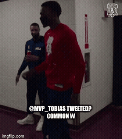 Men Walking Down Hallway GIF