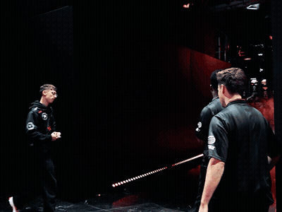 Men Walking In Smoke-Filled Room GIF