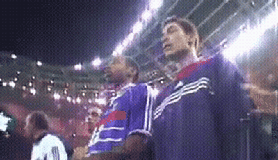 Men Watching Game In Stadium GIF