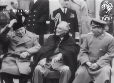 Men Watching Reuters Screen GIF