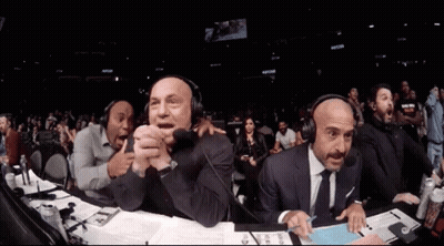Men With Headphones Watching Boxing Match GIF