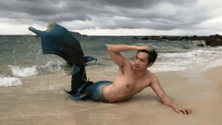 Mermaid Guy On Beach GIF