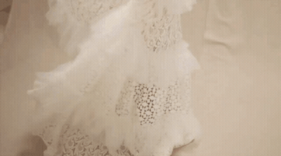 Metro Magazine Woman In White Dress GIF