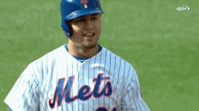 Mets Baseball Player In Blue Helmet And Striped Jersey GIF