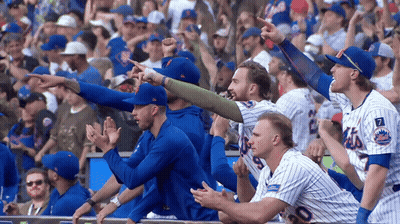 Mets Baseball Players Sitting In Dugout GIF