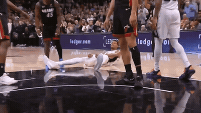 Miami Basketball Player Number 45 Laying On Floor GIF