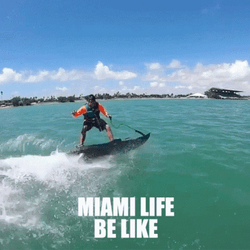 Miami Man In Orange Is Surfing GIF