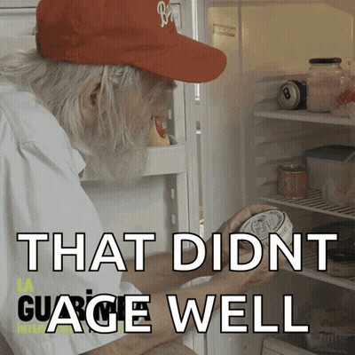 Mice Standing Around Cheese Under Glass Dome GIF