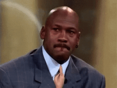 Michael Jordan In Suit And Tie With Child Holding Tie GIF
