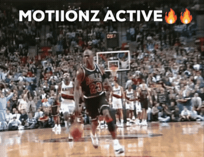Michael Jordan Is Playing Basketball In Front Of A Crowd With The Words Motionz Active Above Him GIF