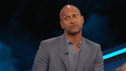 Michael Keegan Pointing Sideways To You GIF