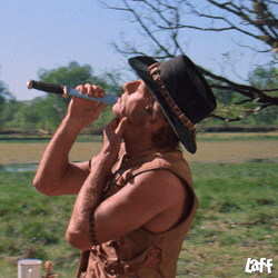 Michael Uses His Knife For Shaving GIF