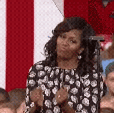 Michelle Obama Clapping At Microphone GIF