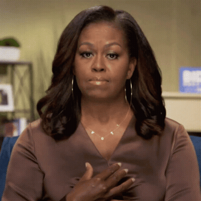 Michelle Obama In Brown Shirt And Necklace GIF