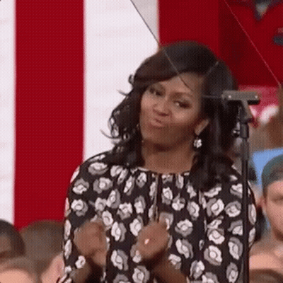 Michelle Obama Making Funny Face At Microphone GIF