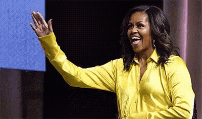 Michelle Obama Waving In Yellow Shirt GIF