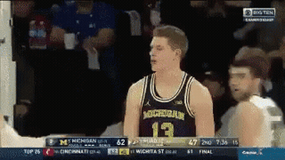 Michigan Basketball Player Talking To Another GIF